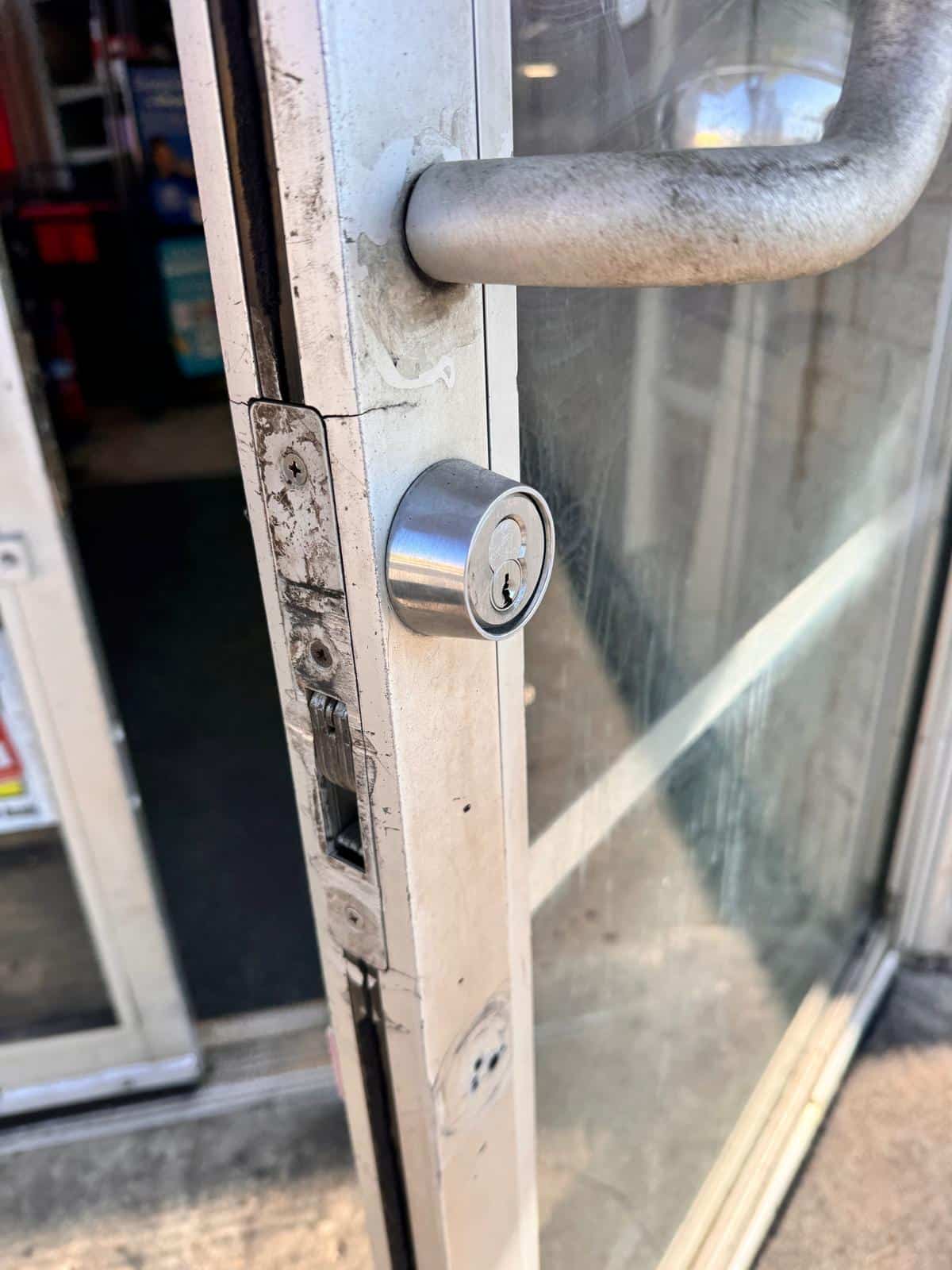 New graded deadbolt installed on the front door of a home in Oklahoma City