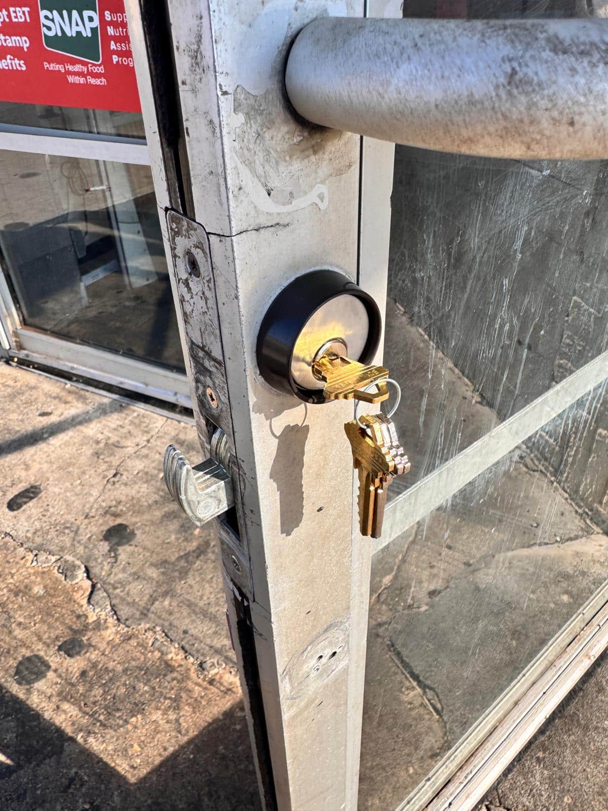 Deadbolt and strike plate fitted by C&R Locksmith on a residential door in the Oklahoma City metro