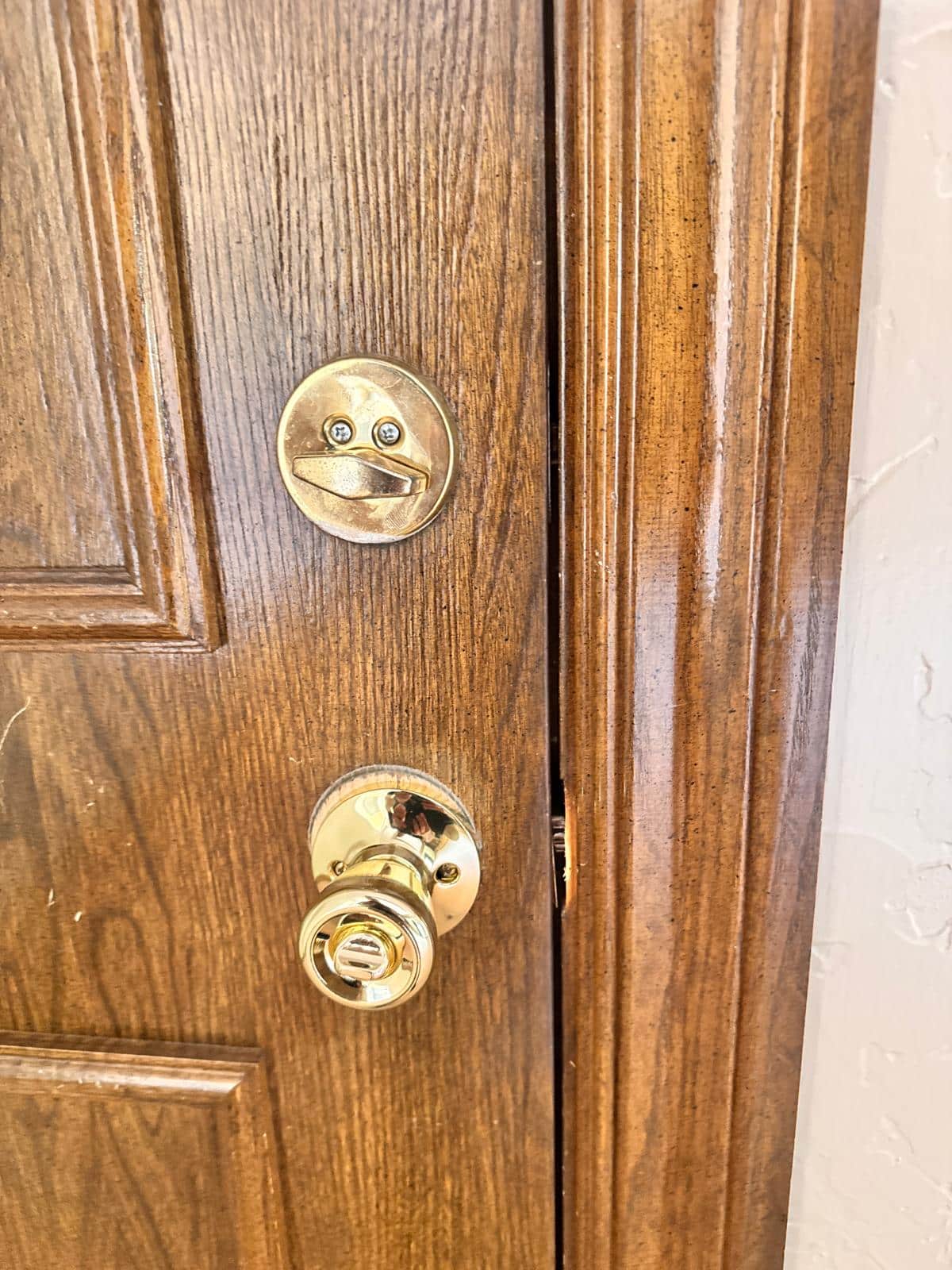 Locksmith repinning a commercial lock cylinder on site at an Oklahoma City business