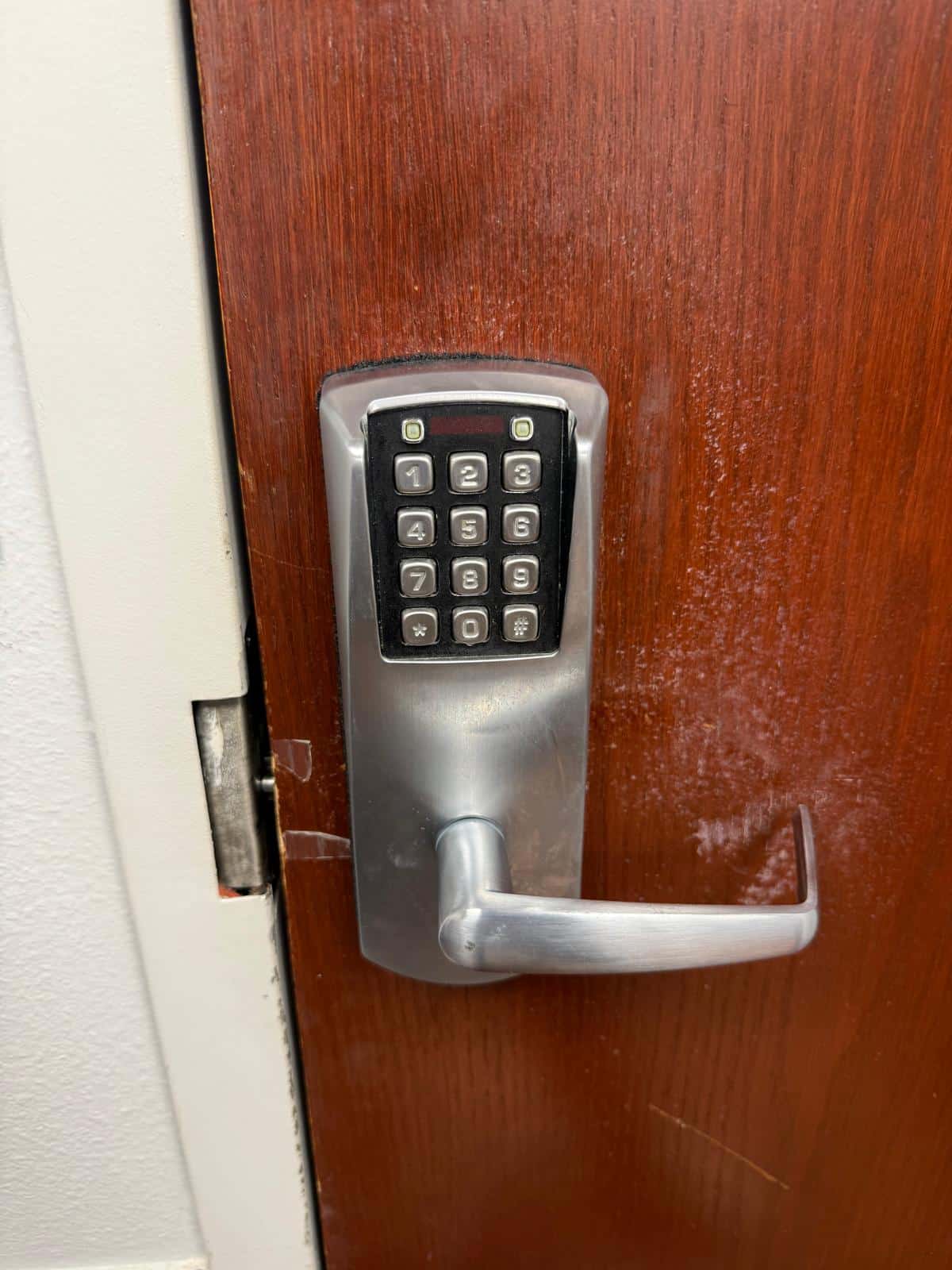 Commercial door lock being serviced by C&R Locksmith in the Oklahoma City metro