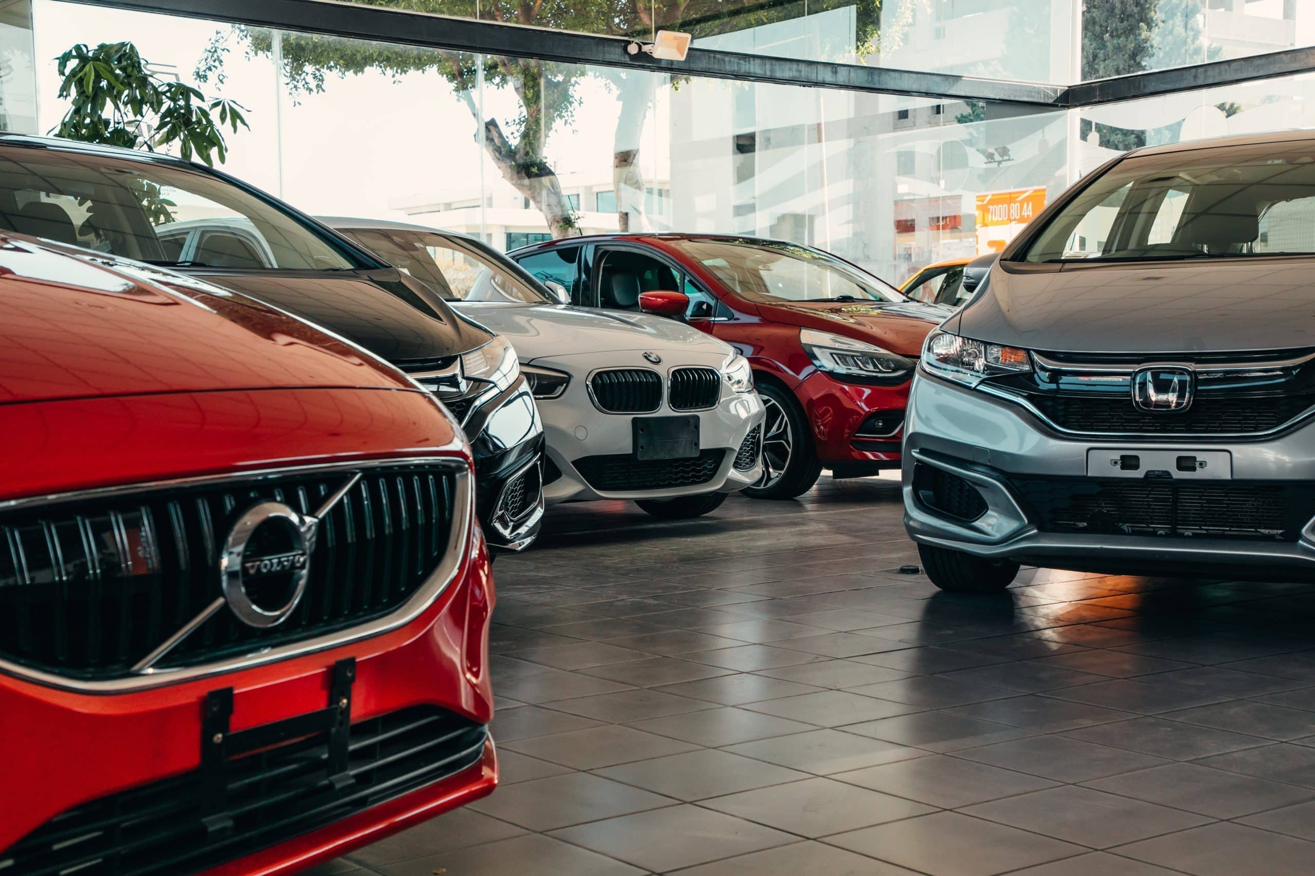 Row of cars on a dealership lot, the alternative to a mobile locksmith for car keys